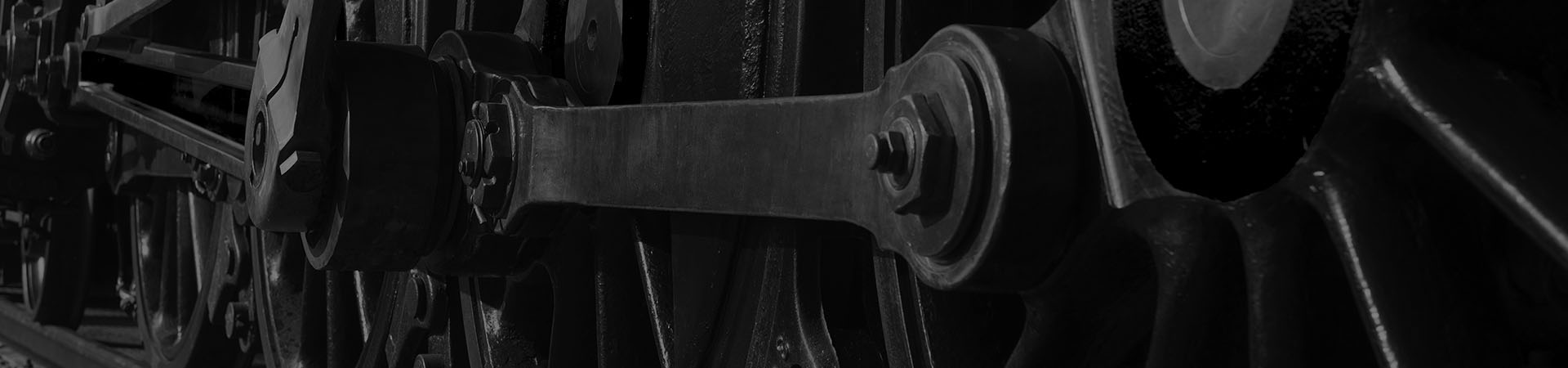 Detail photo of the wheels of a locomotive